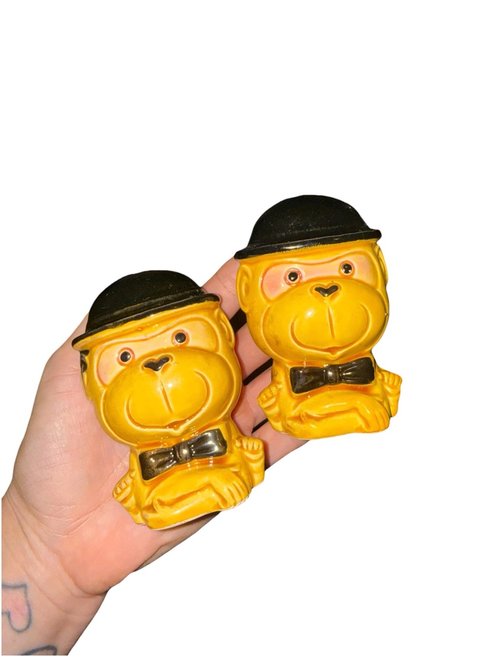 Vintage monkeys in black hats and bow ties